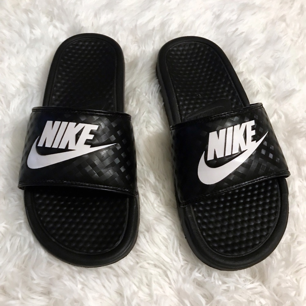 Nike slides.